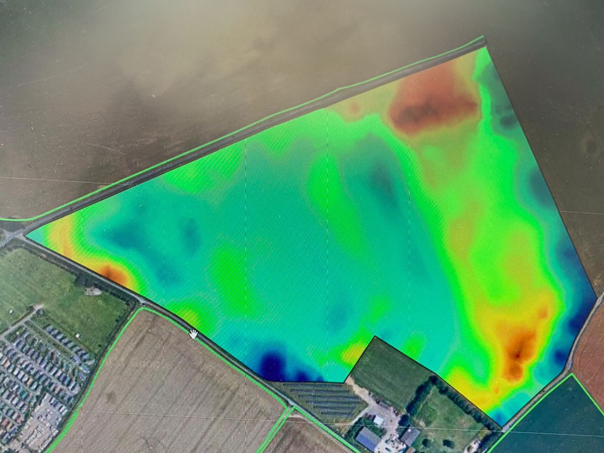 Image of combine and flowers by Quex Park Farming Services